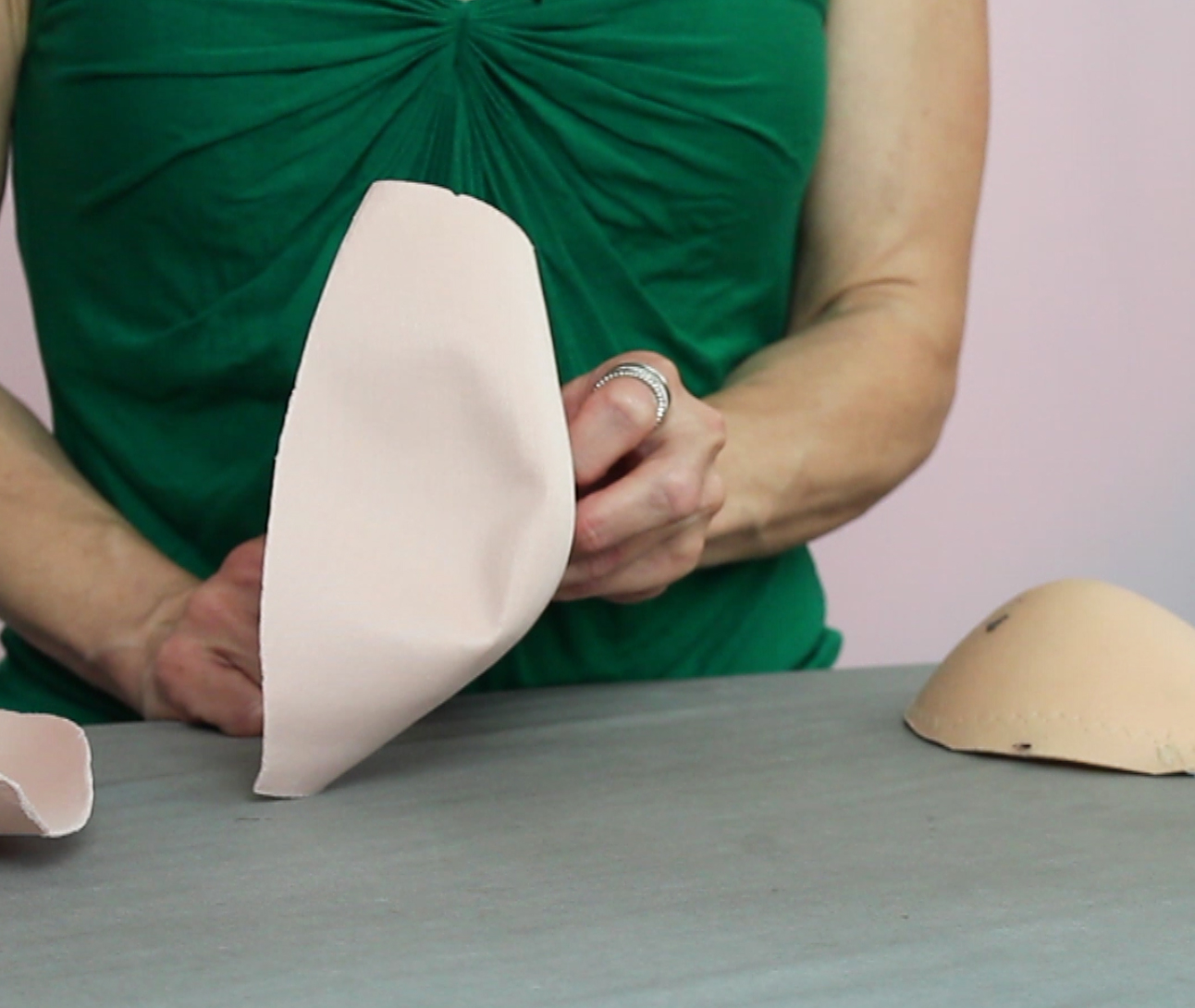 For your competition dance and skate dresses, hot glue two bra cup shells together to create more bust support.