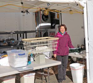 Teresa Sigmon works laundry fire support