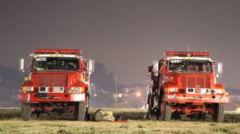 Firefighter sleeps on the ground at Tubbs Fire in Sonoma County California