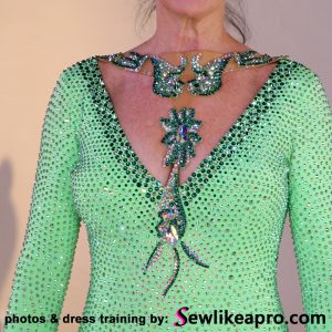 rhinestoned necklace is a strong focal point on the Dancesport ballgown