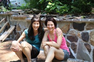 cross country roadtrip, Sew Like A Pro adventure, Crystal Sigmon and Teresa Sigmon working on a retaining wall