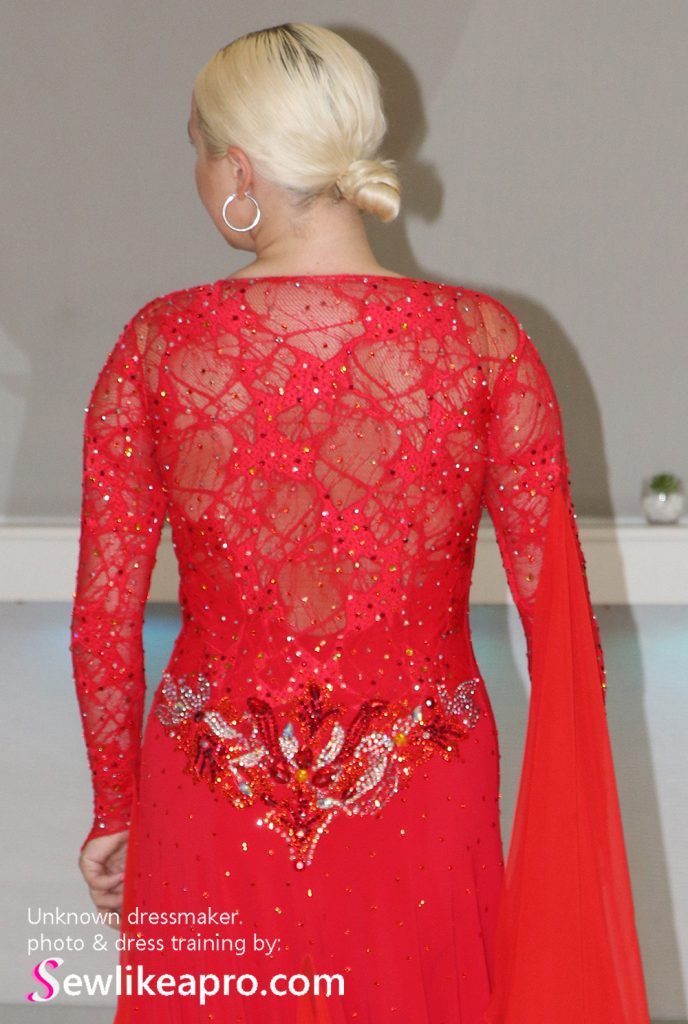 Pretty, Practical Smooth gown with rhinestoned focal point and mesh sleeves, stretch lace