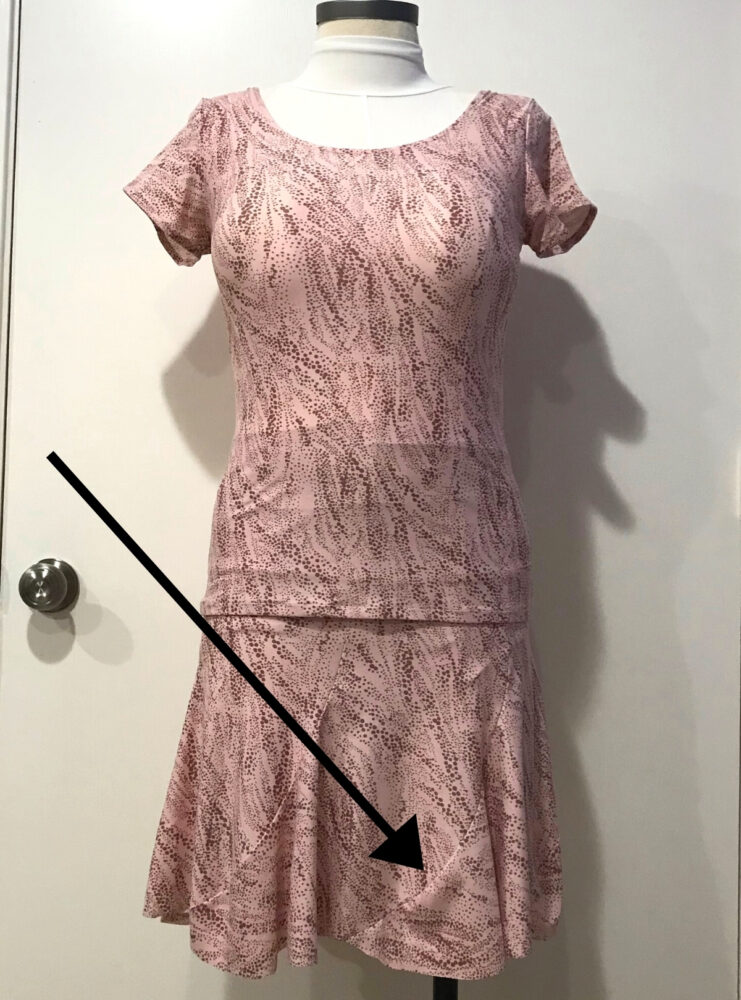 skirt fabric buckles at seam because panels do not match