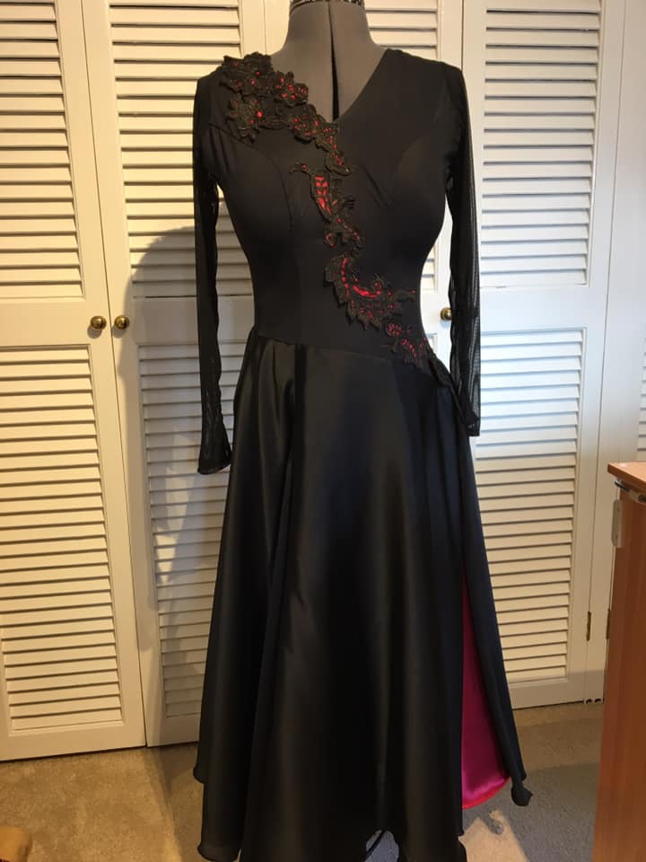 ballroom dress in progress with lace appliques and a slit skirt