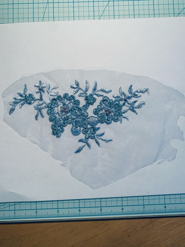 beaded lace appliques onto nylon tulle