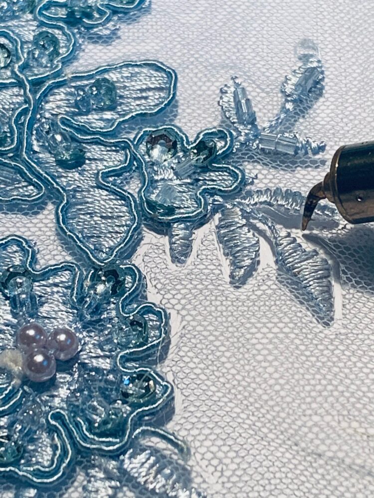 cutting out beaded lace with a hot stencil cutting tool