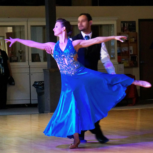 Christina Musser, head instructor at Spotlight Ballroom in West Sacramento, CA, wears a charmeuse ballroom dance dress