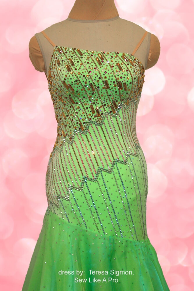 green ballgown with linear rhinestone pattern