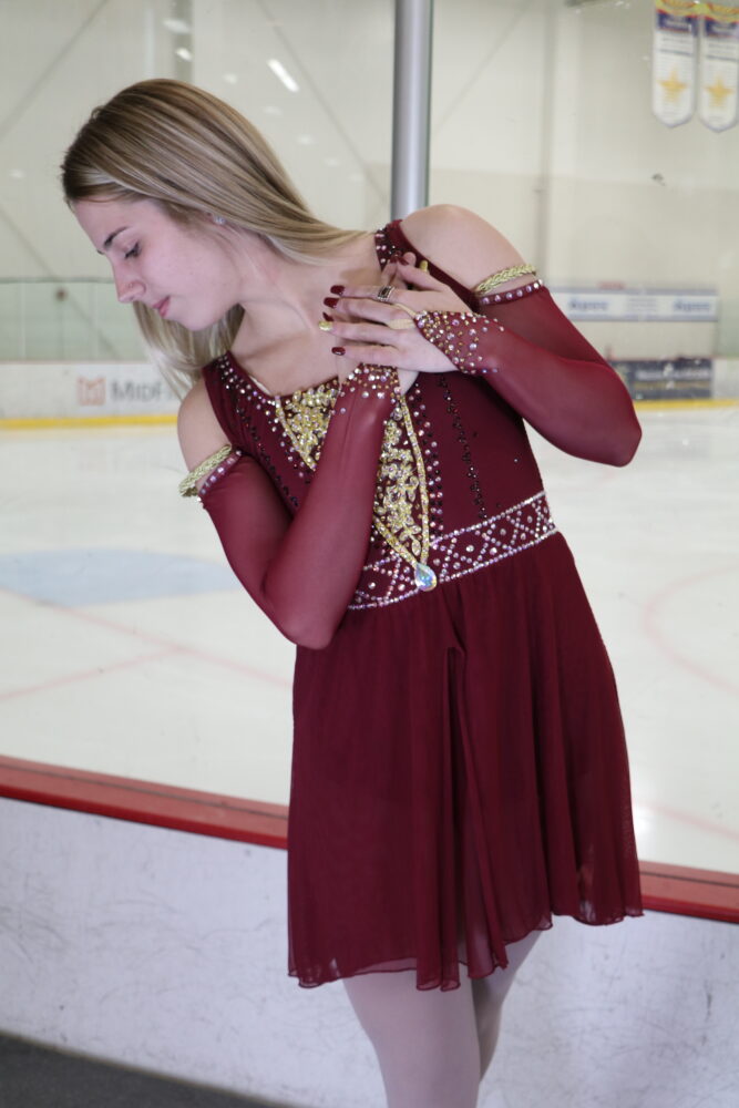 custom designed burgundy Juliet dress made by Tammy Jimenez at Ice Den Chandler in Arizona