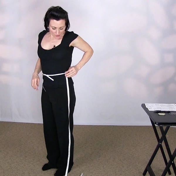 Learn to measure yourself for making women's Dancesport, Latin dance, Artistic roller, ice dance and adult figure skating dresses.  Teresa Sigmon measures her mother in the Sew Like A Pro dressmaker schools.
