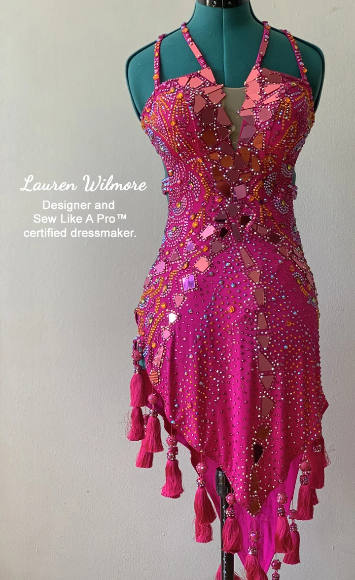 Latin dance dress with rhinestones, acrylic mirrors, fringe tassles, mesh insert, made by Lauren Wilmore, member of the Sew Like A Pro™ Latin-Skate Dressmaker School. Lauren is also a professional Dancesport dressmaker, Made by Lala is her company. Get pro tips and hacks for rhinestoning all style of dance and skate dresses.