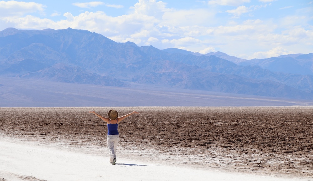 Teresa Sigmon walks the salt flats in Badwater Basin Death Valley National Park, California, USA